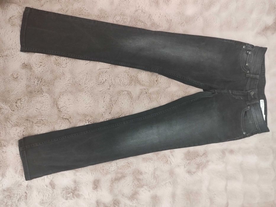 czarne jeansy W 27 L 32