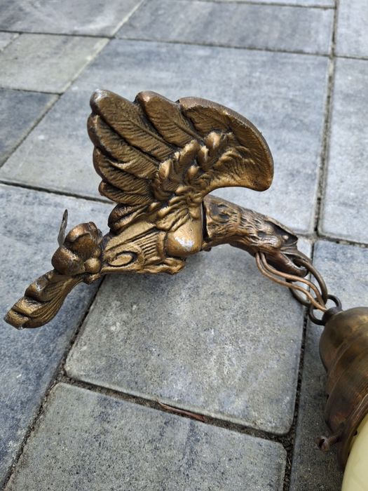 Stary kinkiet w stylu Art Deco z motywem orła