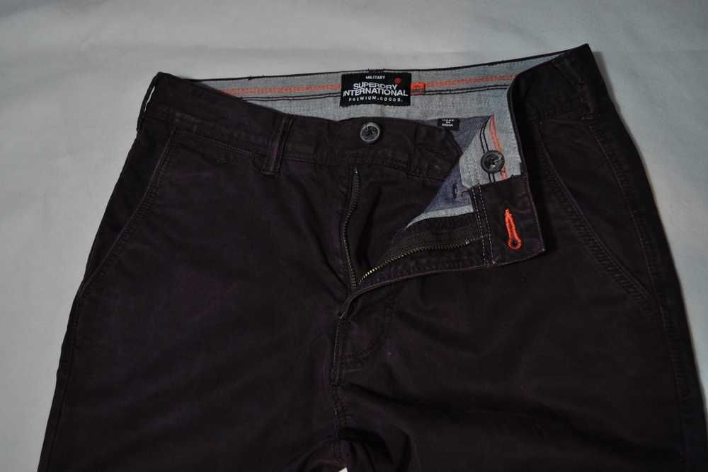 SUPERDRY MILITARY S 82cm 30/30 męskie spodnie jeansowe slim fit s7v