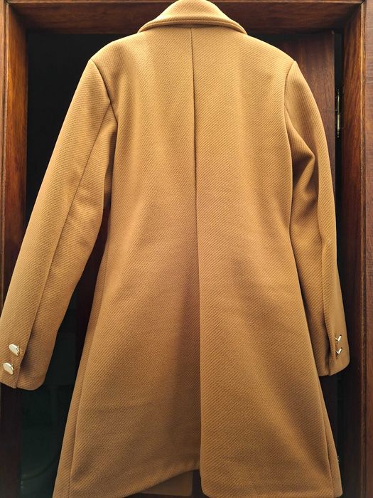 Casaco comprido de mulher