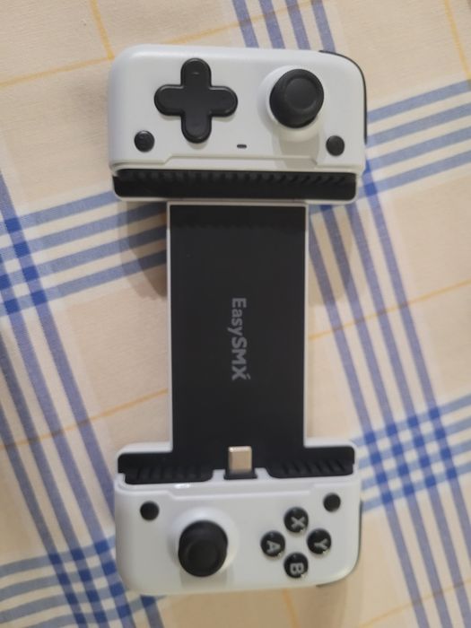 Suporte comando para telemovel