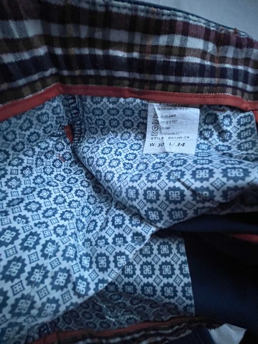 Granatowe męskie, młodzieżowe spodnie wizytowe W:30 L:34