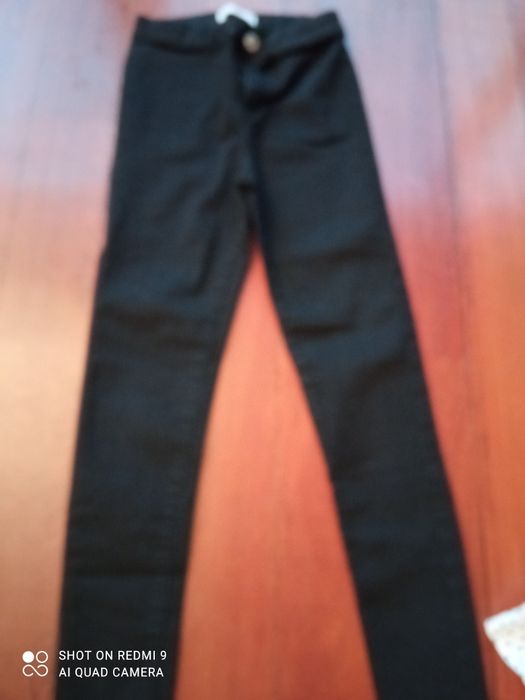 Calças de jeans cor preta