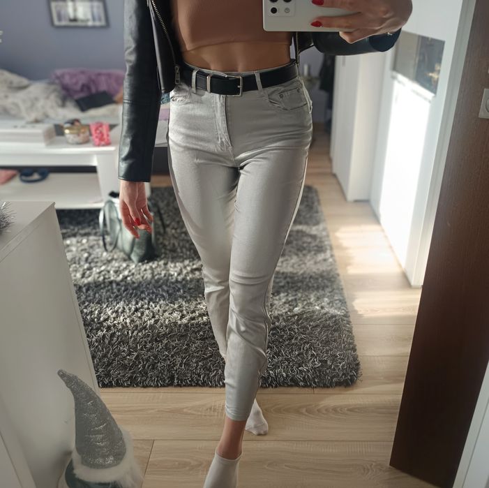 srebrne spodnie L z wysokim stanem błyszczące jeansy nowe