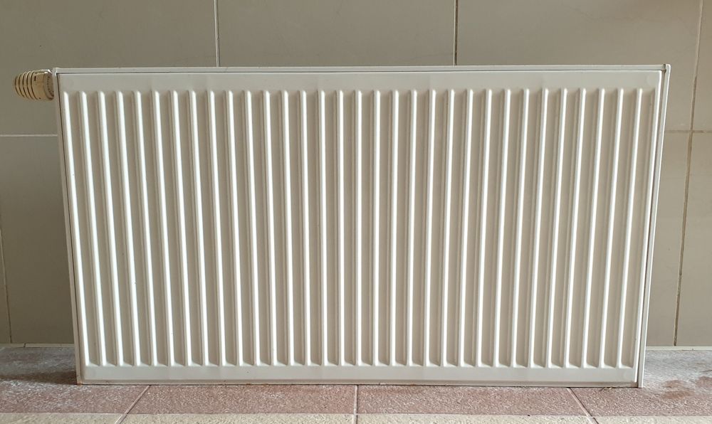 Grzejnik stalowy panelowy boczny  PURMO 600 × 1100 biały