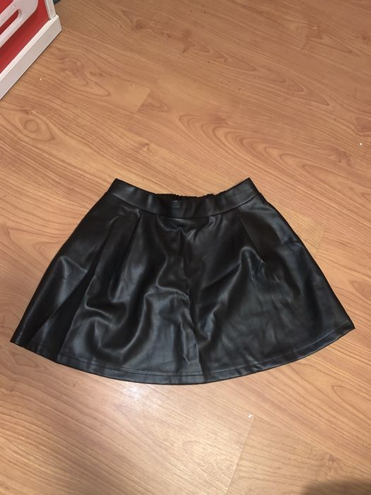 Saia preta 11-12 anos