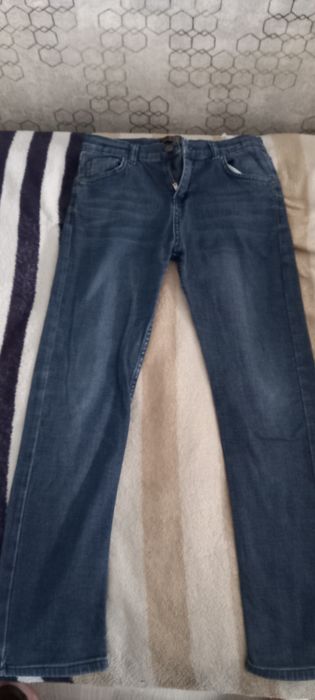 Джинси гуччи синього коліру на дитину 11-12 років 153см