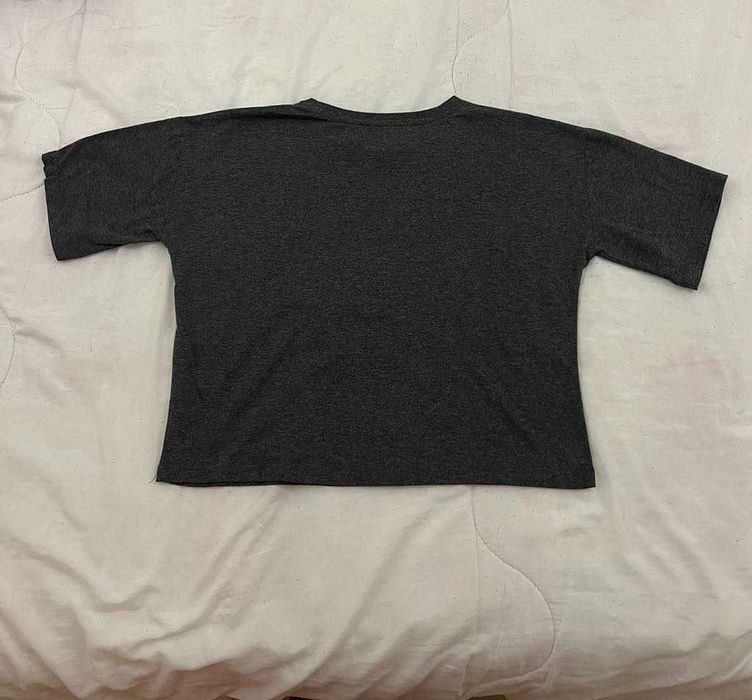 T-shirt Wizarding World Harry Potter com letras douradas de menina