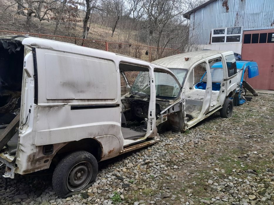 Кузовні деталі фіат добло 01-09.Ланжерони,верхи,боковини,двері, крила.