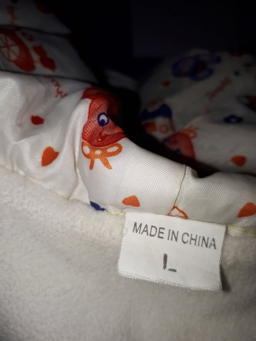 Дитяча куртка жовта в горошок