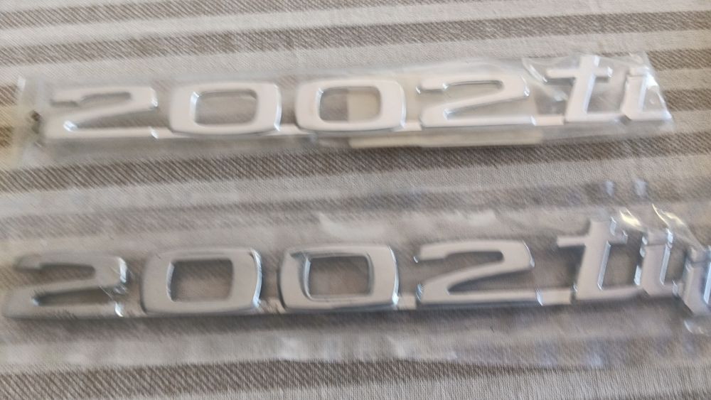 Símbolos BMW E10 e forras tablier