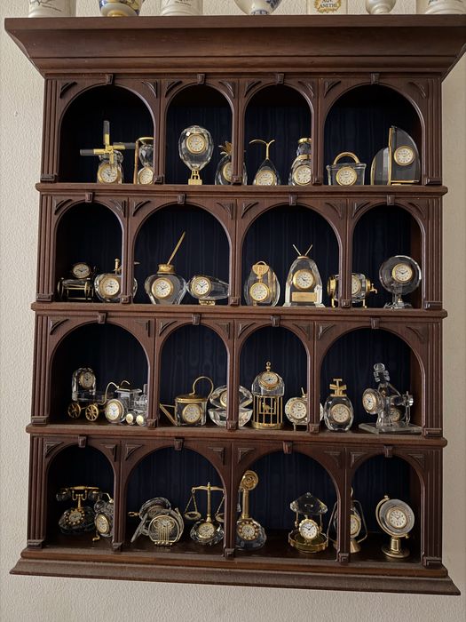 Colecao de relogios em cristal e ouro