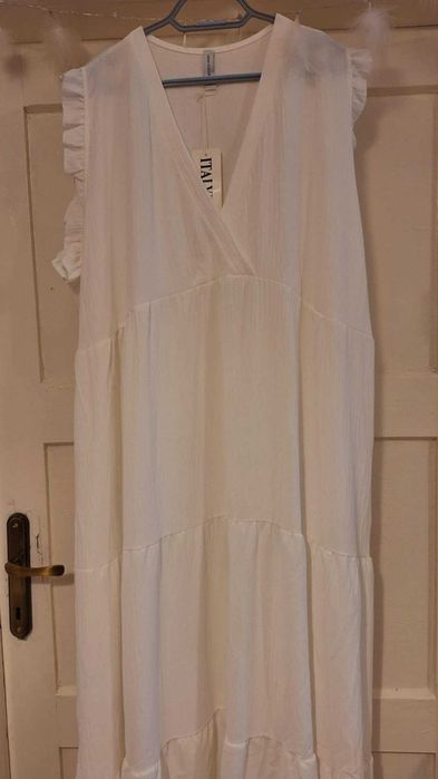 Przecudna Uniwersalna duża sukienka biała.