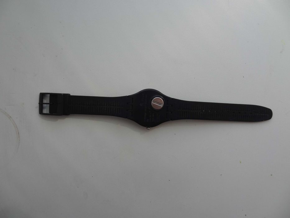 Часы Swatch черные лакированные SUOB101 с открытым механизмом скелетон