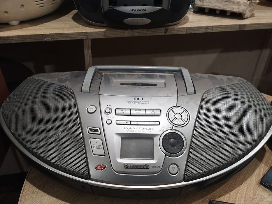 Panasonic сірого кольору