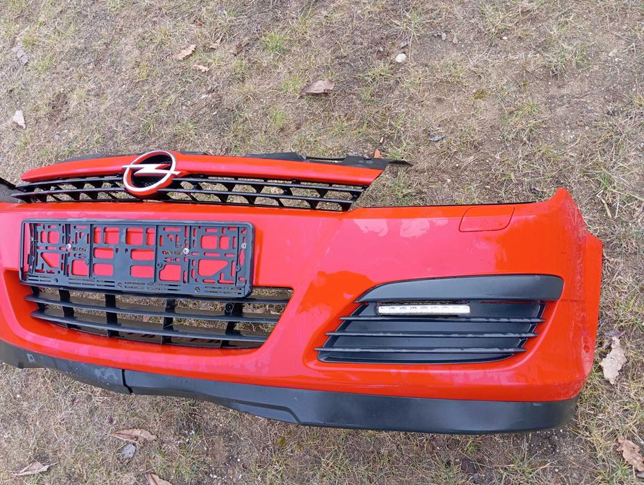 OPEL ASTRA H III Zderzak przód kompletny Grill Oryginał Y547
