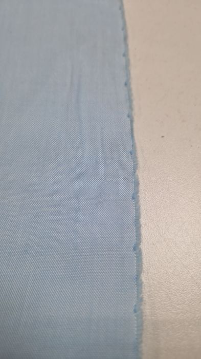 Tkanina błękit szer.154 cm.