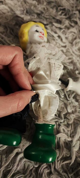 Palhaço boneca porcelana - danos