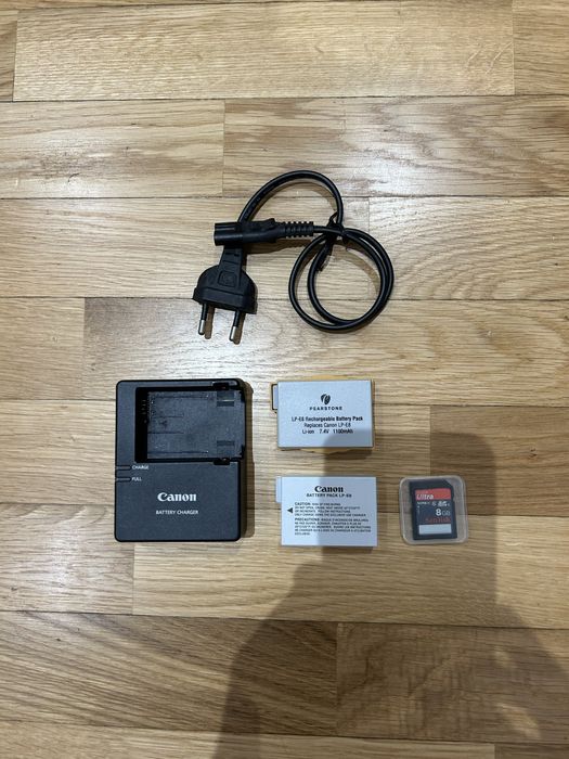 Canon EOS Rebel T3i + uma objetiva + filtros + saco