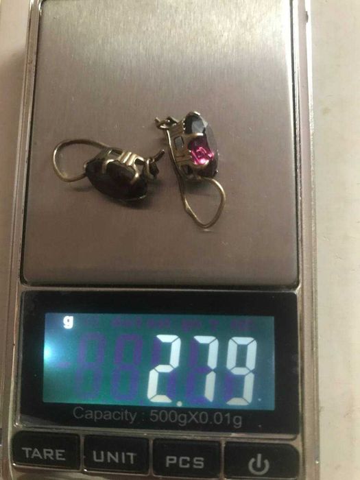 Продам срібні сережки з позолотою і корундом.