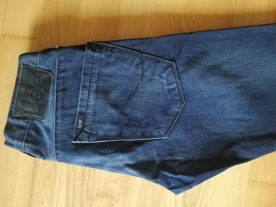 Męskie spodnie jeansowe Lee, W28