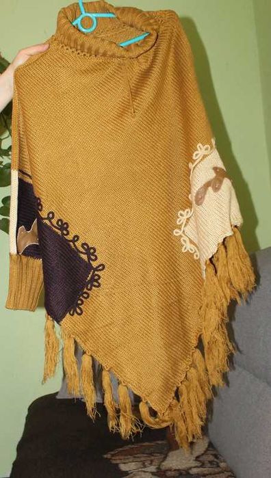 Ponczo damskie z frędzlami
Uniwersalny·Bardzo dobry