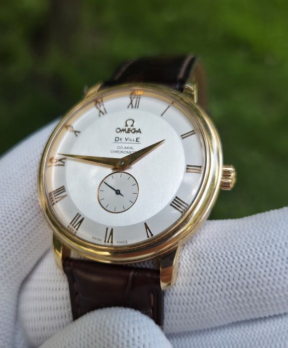 Швейцарскій годинник Omega De Ville