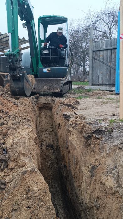 Мини екскаватор гусиничный  аренда доставка в любую точку города течен