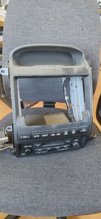 Rádio original Toyota Land cruiser J120  com consola central e comandos de climatização