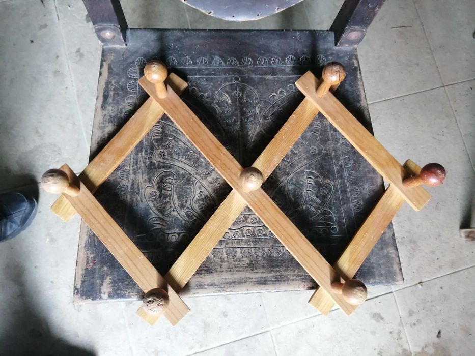 cabide extensivel de parede , ver fotos