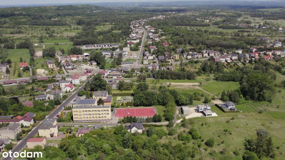 Działka pod budowę domu w zielonej okolicy .