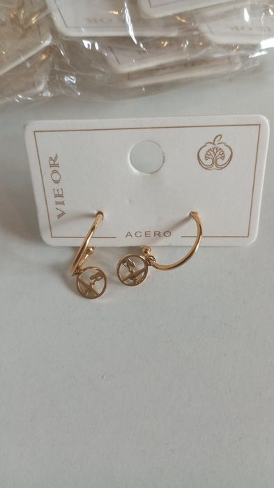Lote 50  em aço pulseiras anéis e brincos