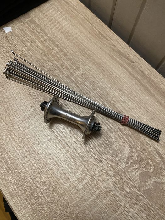 Przednia piasta Campagnolo + szprychy. 100mm 36 szprych. Super stan, jak nowe