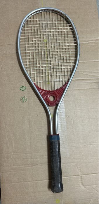 Raquete de tenis usado