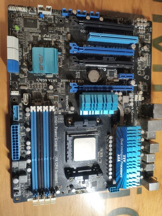 Материнська плата Asus + процесор AMD ( стан не відомий)