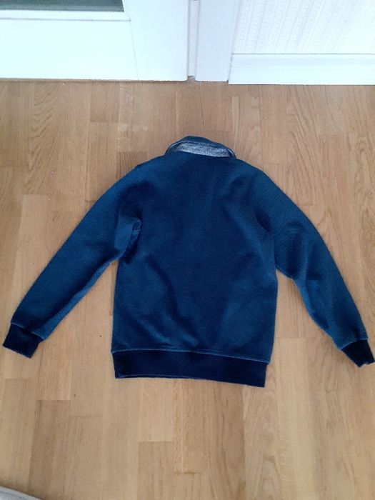 Кофта синего цвета поло