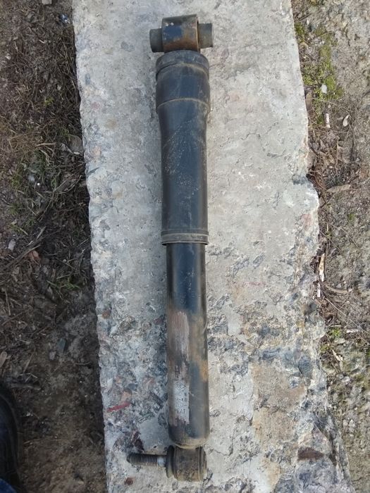 Амортизатор задній Рено Меган 3 (універсал)