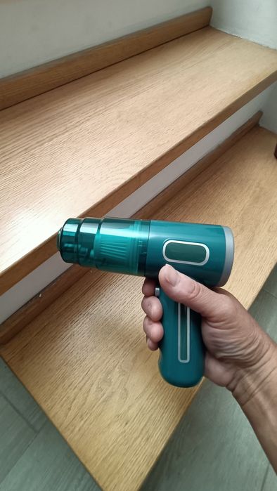 Mini aspirador portátil