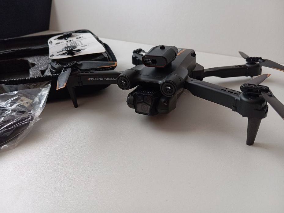 Nowy dron model M17 czujnik  ruchu 30 min lotu 

gwarancja na wszystki