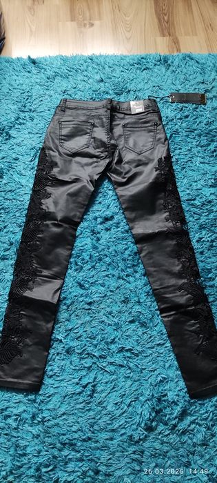 Spodnie woskowane koronka rozm.L/40