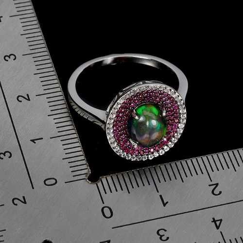 Кольцо S 925 пробы с черным опалом 9x7 мм, рубином топазом. Р18.75