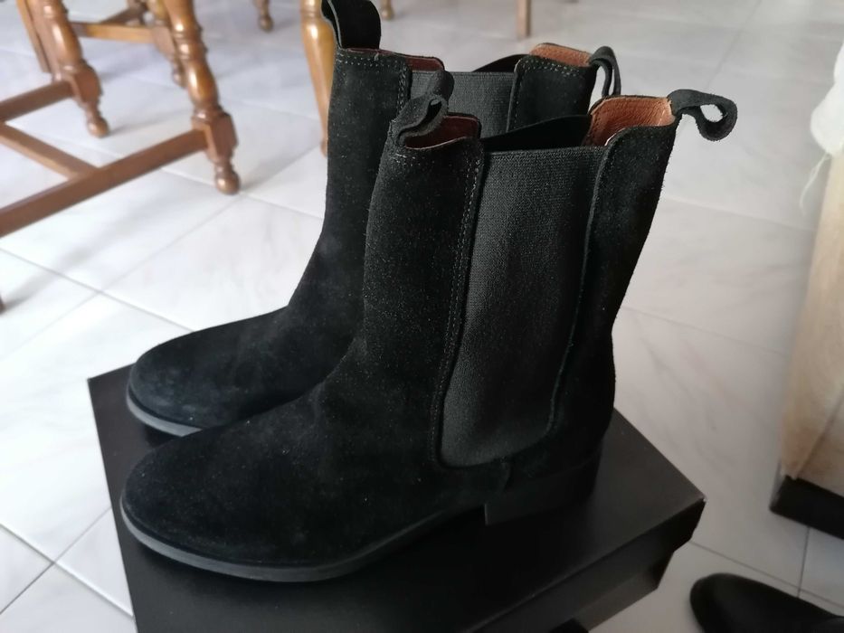 Botas novas pele genuína