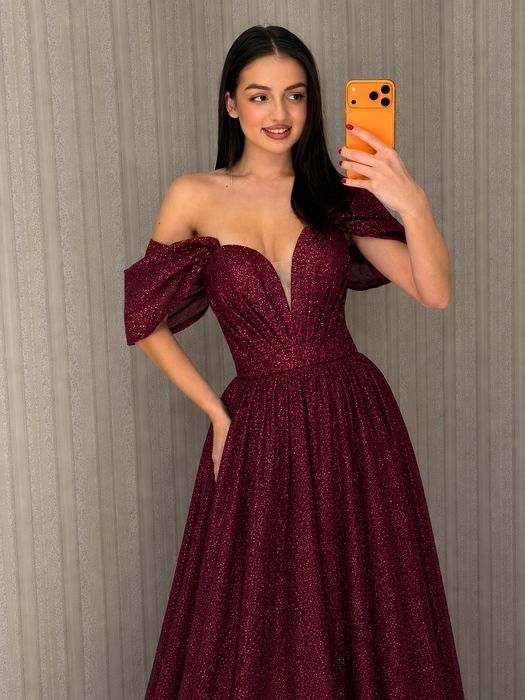 Сукні на випускний вечір