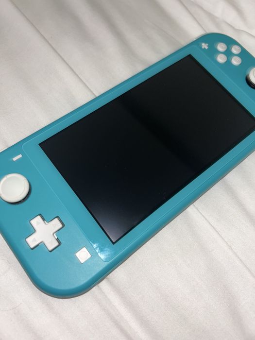 Nintendo Switch Lite Turquesa + Super Mario + Acessórios