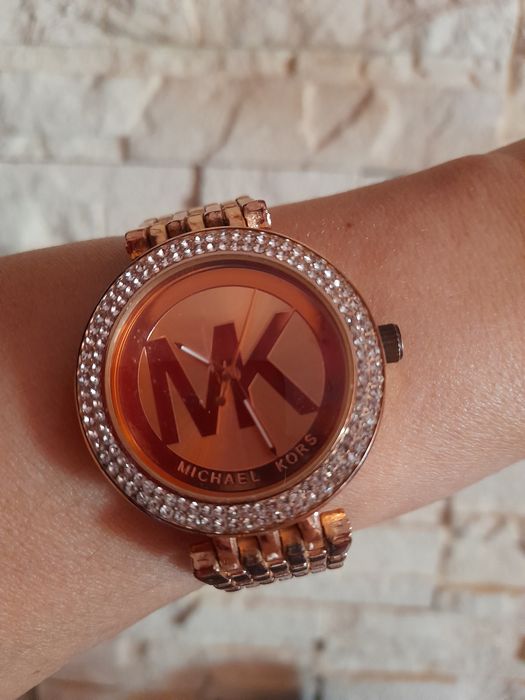 Elegancki damski zegarek  duża tarcza z cyrkoniami kolor złoty