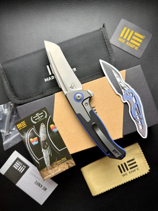 Нож WE Knife Press Check Flipper Elishewitz Titanium Blue G10 CPM-20CV
