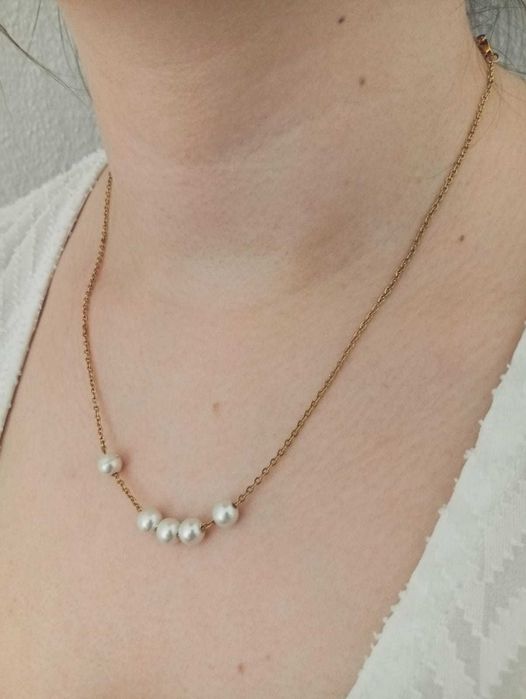 Fio Dourado em Aço com Pérolas