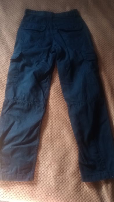 Młodzieżowe spodnie baggy z kieszeniami Bershka jak nowe r. 32