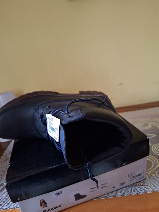 Trapery firmy hush puppies.