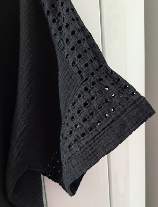 Śliczna duża czarna  bluzka damska roz 58